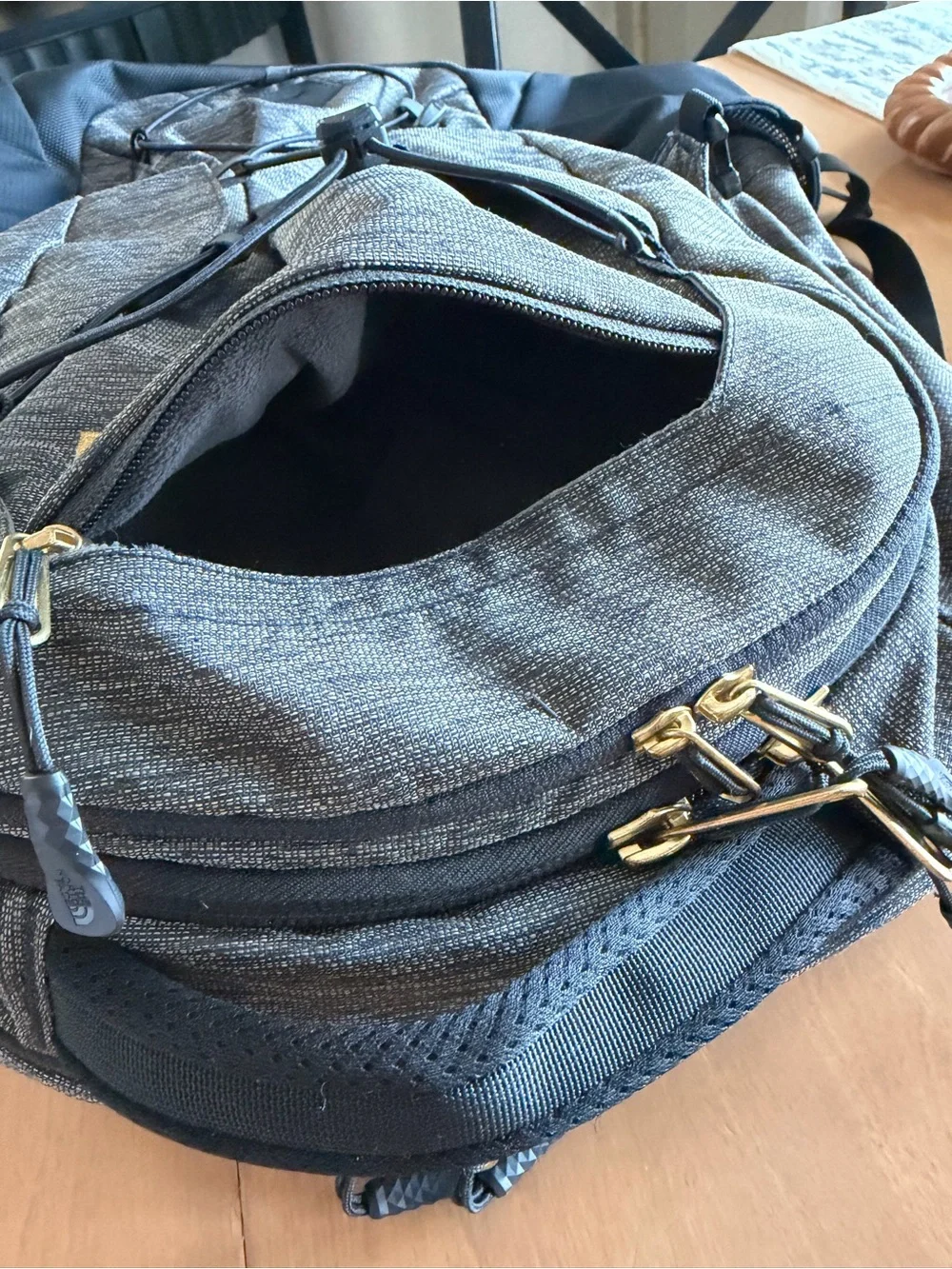 The North Face Borealis Backpack in Charcoal and Black with Gold Logo